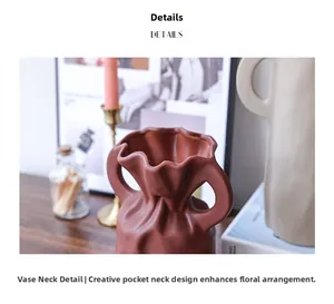 Macro detail of terracotta ceramic vase showing unique pleated pouch-style rim and texture