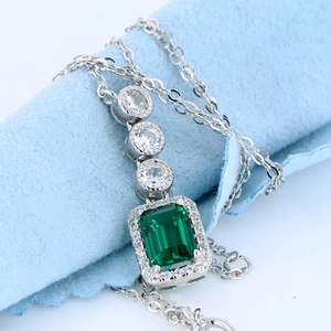 1ct emerald cut green gemstone pendant in S925 sterling silver with zircon accents
