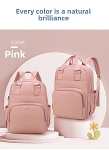 Pink waterproof nylon mummy backpack with side pockets and smooth zipper details