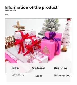 Pink Christmas wrapping paper roll with cartoon Santa patterns and 43x300cm size details