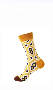 Detail of vintage geometric plaid cotton crew socks with yellow and navy diamond pattern
