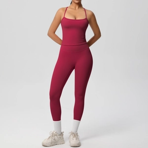 Close-up of burgundy high-waisted yoga set featuring sports top and leggings