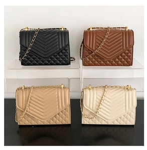 Quilted flap crossbody bags in black, brown, and beige with gold chain straps for women