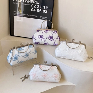 Elegant lace evening bags with floral embroidery and vintage metal chain straps