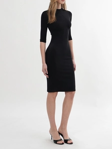Slim fit black mock neck knit dress with medium sleeves and ribbed texture design