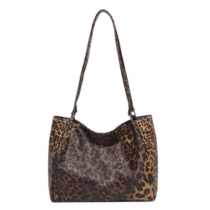 Large vintage leopard print tote bag for women with long shoulder straps and metal hardware