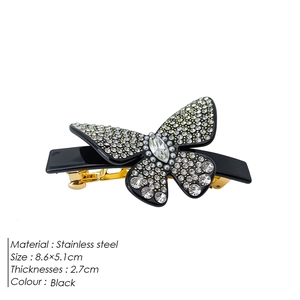 Elegante fermaglio per capelli a farfalla con strass lucidi e base in acciaio oro