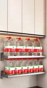 Strong load-bearing gun grey kitchen rack holding heavy bottled water on dual wall shelves