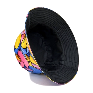 Close-up of double-sided bucket hat with colorful cartoon duck print and fine stitching detail