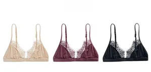 Dettaglio dei reggiseni a triangolo in pizzo nei colori beige, bordeaux e nero