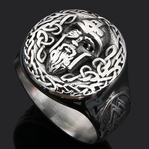 Macro shot of Viking wolf ring featuring embossed Celtic skull and vintage silver details
