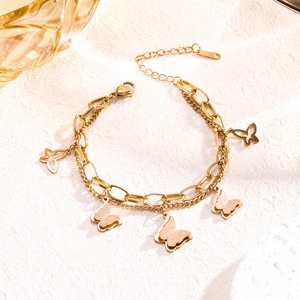 Double-layered golden butterfly bracelet with frosted and hollow charms on a chain
