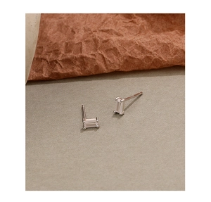 Detailed close-up of S925 sterling silver stud earrings with rectangle cubic zirconia