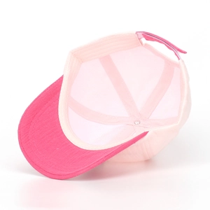 Inside view of a pink kids' baseball cap with velcro strap and twill cotton panels