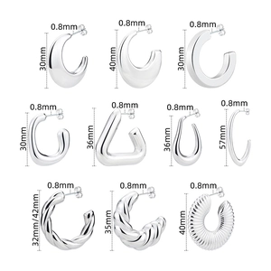 Set of minimalist silver geometric earrings featuring hollow twist and textured designs