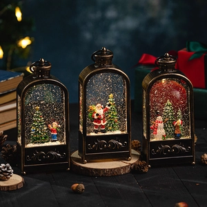 Vintage bronze Christmas lantern with Santa and snowman scene, warm holiday light decor
