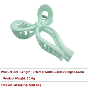 Detail view of mint green matte bow claw clip showing size specs 10.9x6.3x4.6cm