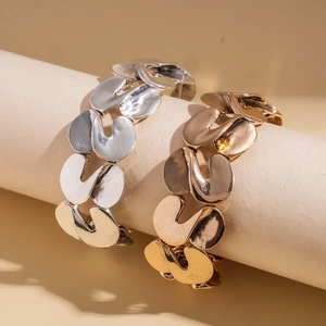 Minimalist S-shaped twisted metal bracelets in gold and silver finish for women