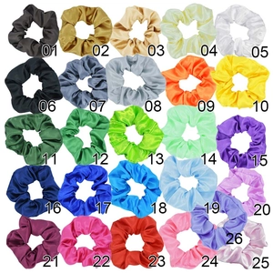 Set of 26 colorful satin hair scrunchies displayed in a grid with numbered color options