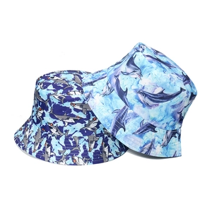 Navy shark and light blue dolphin print bucket hats for sun protection and outdoor style