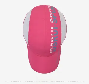 Detailed top view of a breathable pink quick-dry sports cap with white mesh panels