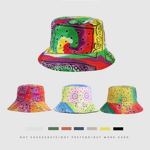 Detail view of multi-color paisley print bucket hats in four stylish color combinations