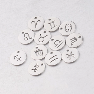 Detailed view of 12mm stainless steel zodiac charms for DIY jewelry making sets