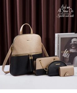 Detail view of a 4-piece PU leather backpack set with gold chain and tassel accents