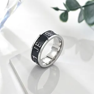 Vintage stainless steel wide ring with black enamel and Jesus relief lettering