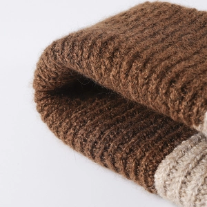 Thick wool knit beanie in brown and beige contrast stitching for winter warmth
