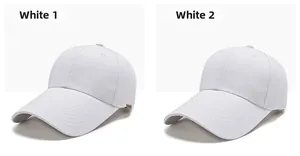 Close-up of two white cotton baseball caps with reinforced stitching and logo labels