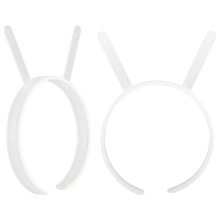 Detailed close-up of white rabbit ear headbands made of smooth and durable plastic