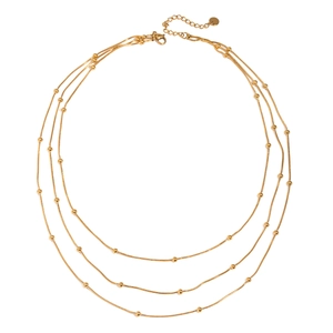 Three-layer gold layered necklace featuring delicate chains and polished round beads
