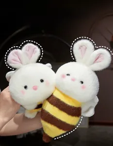 Detailed view of a soft plush rabbit bee toy featuring yellow and brown striped body