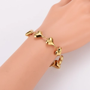 Elegant gold hollow heart link bracelet for women crafted in polished stainless steel