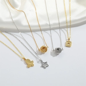 Collection of retro star and butterfly pendant necklaces in gold and silver finishes