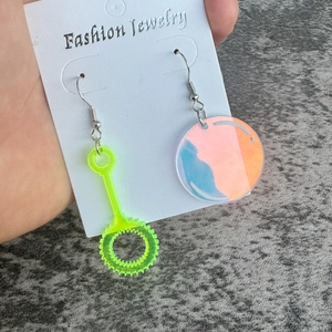 Asymmetric bubble wand and iridescent acrylic circle drop earrings with silver hooks