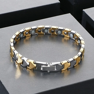 Detailed view of bicolor magnetic energy bracelet with tungsten steel and H-shaped links