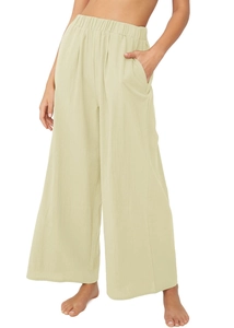 Vue frontale du pantalon large en coton vert clair à taille haute élastiquée