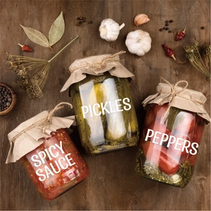 Canning jars with vinyl letter stickers for spicy sauce, pickles, and peppers labels