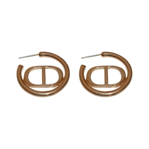 Elegant rose gold round hoop earrings with iconic geometric CD letter design elements