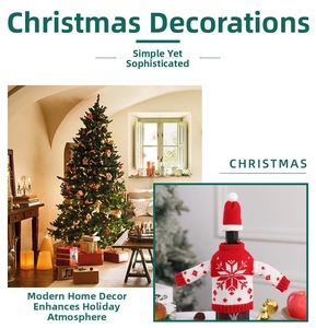 Detailed view of red knitted Christmas wine bottle sweater with snowflake pattern and mini hat