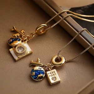 18k gold plated stainless steel travel necklace with airplane and camera charms