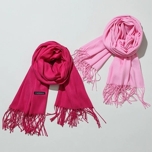 Solid cashmere-feel scarf set in deep rose and light pink with elegant tassel detailing