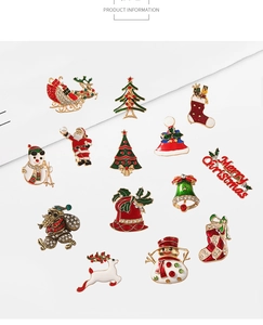 Detail of Christmas brooches with Santa and Snowman motifs in alloy and rhinestones