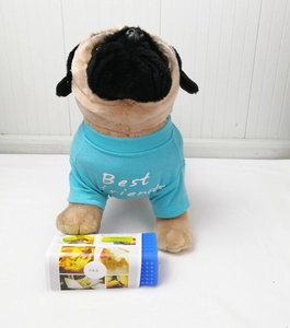 Close-up of pug plush toy wearing blue Best Friends t-shirt and holding a small blue bucket