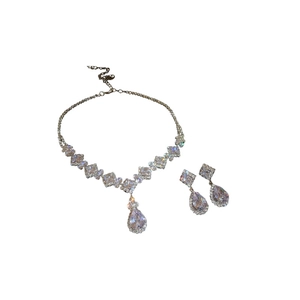 Elegant silver zircon necklace and earring set with diamond-shaped water drop pendants