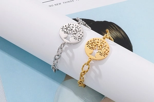 Detail of Tree of Life pendant on gold and silver chain bracelets with OT toggle clasps