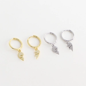 S925 silver Best Friends heart earrings in gold and silver finish on white background