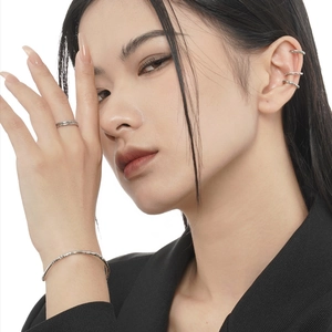 Elegant S925 sterling silver jewelry set with irregular textured bracelet and ear cuffs